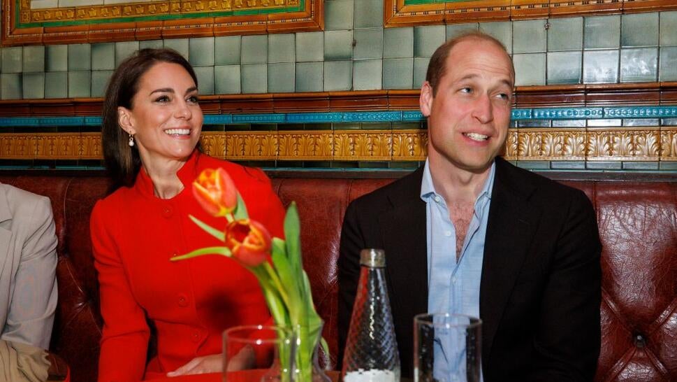 Prince William, Prince of Wales and Catherine, Princess of Wales chat to local business people as they visit the Dog and Duck pub in Soho ahead of this weekend's coronation on May 4, 2023 in London, England.